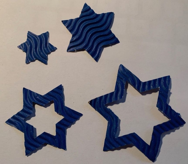 Sterne / Sternli aus Wellen-Wellpappe / Wellkarton blau